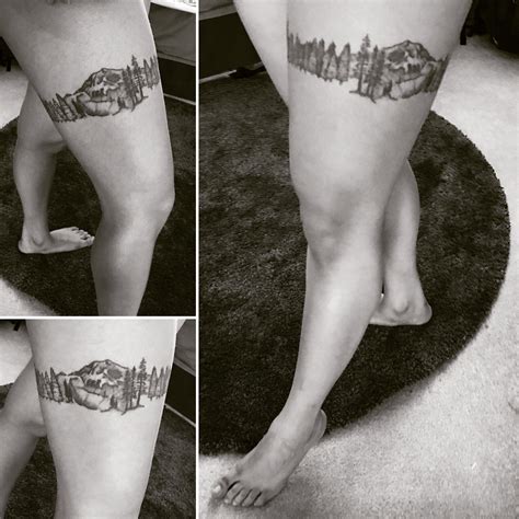 mountains leg tattoo